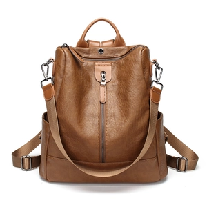 Brown soft leather anti-theft backpack for women with adjustable shoulder straps