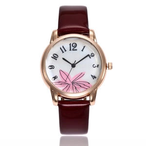 Fashion women's quartz watch with burgundy patent leather strap and rose gold floral dial