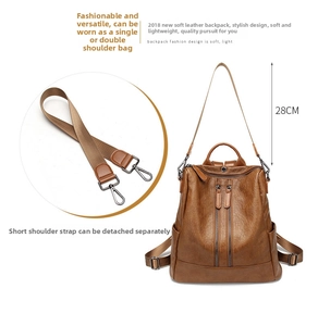 Brown soft leather backpack detailing the 28cm height and detachable shoulder strap