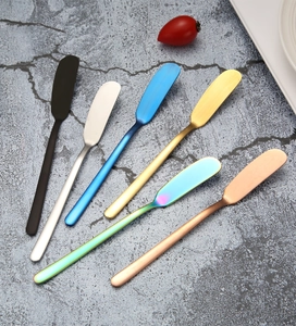 Detailed top view of 304 stainless steel butter knives in six vibrant metallic colors