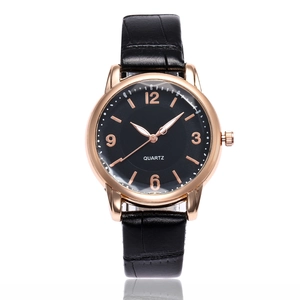 Minimalist women's quartz watch with black leather strap and rose gold round case