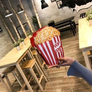 Creative popcorn bucket crossbody bag with red and white stripes and metal chain strap