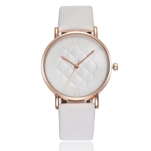 Elegant rose gold women's watch with white grid leather strap and quilted dial face