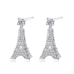 Detailed view of silver Eiffel Tower earrings with shimmering cubic zirconia pavé