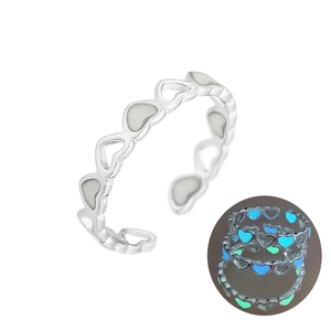 Detailed view of adjustable luminous heart ring with glowing blue and green neon effects