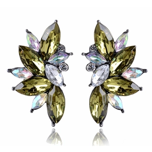 Detail of wing-shaped rhinestone earrings with olive green crystals and dark grey base