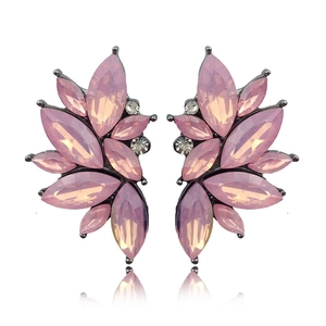 Detailed close-up of pink marquise gemstone earrings with black alloy wings