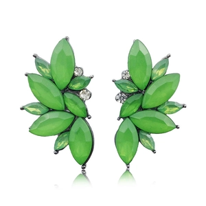 Detailed view of green marquise-cut cluster leaf earrings with rhinestone accents