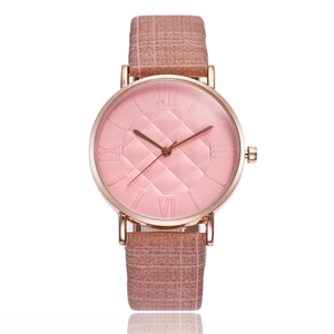 Slim women's quartz watch with pink grid dial and rose gold case on brown leather strap