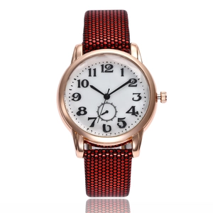 Fashionable quartz watch with rose gold case, large numeric dial and red black honeycomb strap