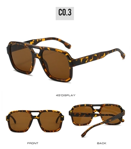 Detail view of tortoiseshell aviator sunglasses with brown lenses and double bridge design