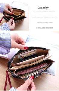 Detail view of the black wallet interior showing multiple card slots and phone pocket