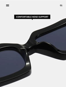 Close-up of the comfortable integrated nose support design on black polygon sunglasses