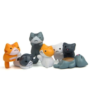 Lot de 7 figurines de chats de dessin animé dans diverses poses et couleurs variées