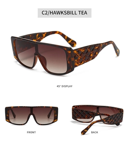 Detailed views of tortoise shell oversized square sunglasses with diamond pattern on temples