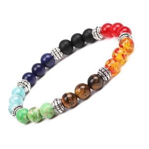 Chakra bead bracelet with tiger eye and lapis lazuli on a clean white background