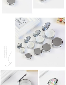 Macro view of round silver pill box set with internal compartments and mirrored lids