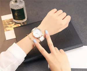 Minimalist white leather strap watch with rose gold case and gold ball bracelet set