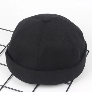 Bonnet docker noir classique sans bord en coton sergé respirant avec design rétro chic