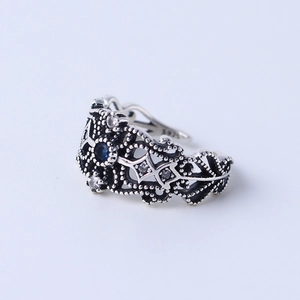 Vintage hollow S925 silver ring with blue crystals and adjustable open band design