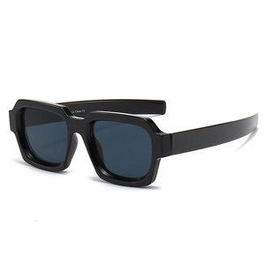 Modern square black oversized sunglasses with thick frames and dark gray lenses for women