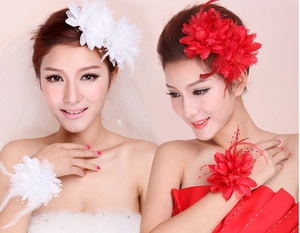 Close-up of elegant double rose hair clip and matching wrist flower set for weddings