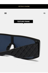 Detail view of large shield sunglasses featuring black glossy frame and textured temples