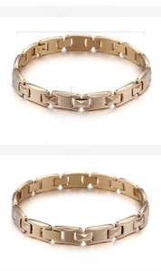 Detail of gold-plated business bracelet showing 230mm length and 10mm width measurements