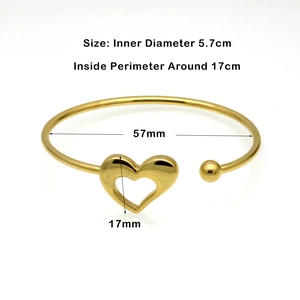 Polished 18K gold stainless steel open bangle featuring hollow heart and bead design