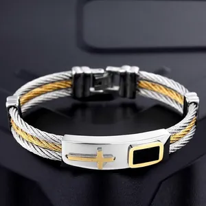 Two-tone stainless steel cable bracelet for men with golden cross and black enamel detail