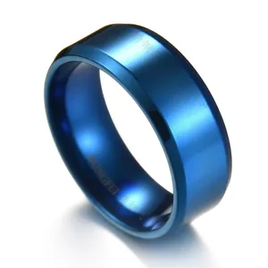 Close-up of a minimalist wide blue plated stainless steel ring with polished finish