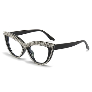 Fashion cat-eye glasses with sparkling rhinestones and black frame with clear lenses