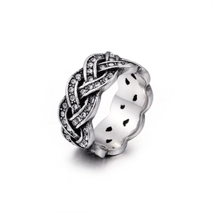 Vintage silver stainless steel ring featuring a luxury braided design with inlaid crystals