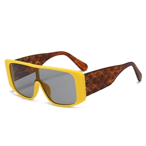 Modern oversized shield sunglasses with bright yellow frame and tortoiseshell arms