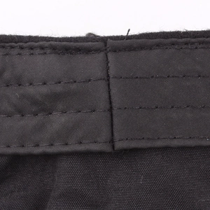 Woolen military captain hat showing close-up of premium black twill fabric stitching