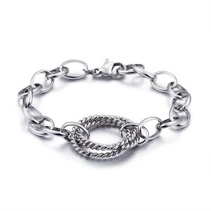 Silver interlocking titanium steel bracelet with twisted ring detail on white background