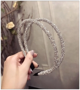 Detail of silver double thin rhinestone headbands with anti-slip protective black tips