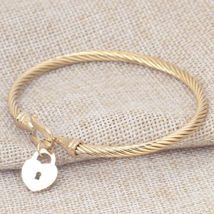 18K gold cable wire twist bracelet featuring a polished heart lock pendant design
