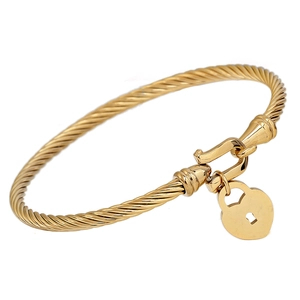 Detailed macro view of 18K gold twisted cable bracelet with a polished heart lock pendant