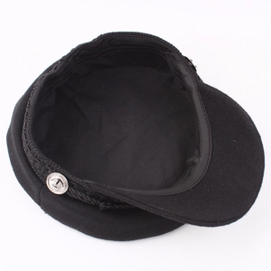Classic black wool navy cap with silver anchor buttons and braided rope decoration