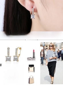 Detail view of gold zircon earrings with square crystals and elegant lifestyle styling