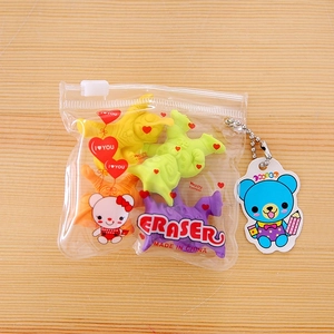 Detailed view of four colorful 3D cartoon erasers stored in a clear PVC zipper pouch
