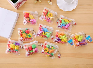 Detailed view of assorted creative cartoon erasers in transparent resealable packaging