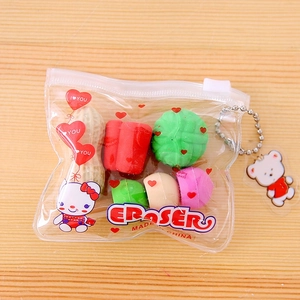 Detail of cartoon vegetable and pastry erasers set in a clear PVC zipper storage bag
