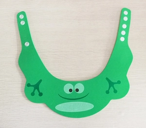 Adjustable green frog baby shower cap made of soft waterproof material with snaps