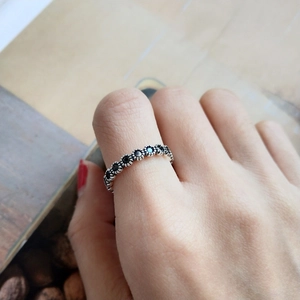 Detailed close-up of S925 silver vintage ring with black zircon and blue opal stone