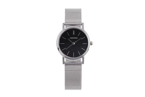 Detail of silver mesh band and black minimalist watch dial with silver hour markers