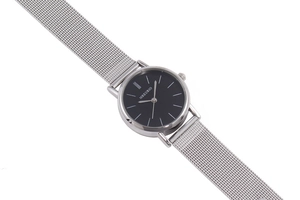 Detail of silver mesh band and black minimalist dial of this stainless steel watch