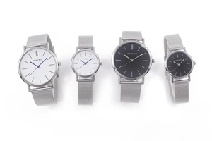 Detail view of MREURIO minimalist quartz watches with silver mesh straps and pair dials