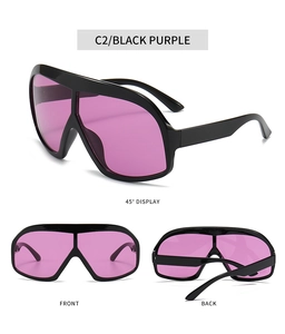 Detail view of large-frame sunglasses featuring C2 black frame and purple lenses